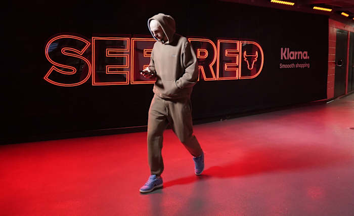 Chicago Bulls guard Alex Caruso (6) enters the building before the game against the Minnesota Timberwolves at United Center.